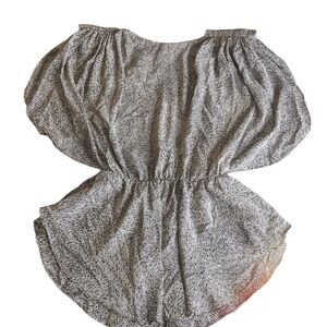 Scarlett Black and White Flowy Blouse with Fitted Waist.